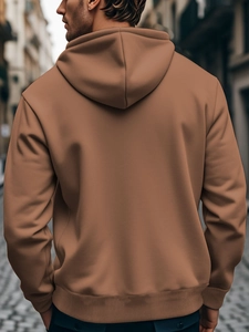 Rear view of caramel oversized hoodie featuring a stylish hood and drop shoulder cut