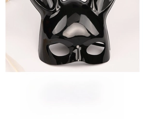Close-up of black glossy bunny mask with long ears for Halloween costume parties
