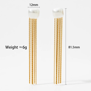 Detail view of long pearl tassel earrings showing 12mm width and 81.5mm length dimensions