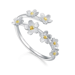 Elegant S925 sterling silver ring with seven delicate silver flowers and gold centers