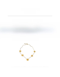 Détail du collier fleur en acier titane doré avec dimensions 42cm et poids 14,6g