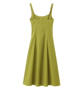 Detailed view of the grass green A-line dress with adjustable straps and waist-cinched design