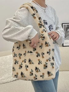 Cute off-white sherpa tote bag with floral patterns and a colorful letter patch