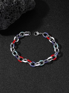 Detail of colorful enamel stainless steel chain link bracelet with lobster clasp and textured rock