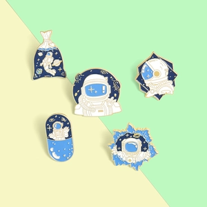 Five-piece cartoon astronaut enamel pin set featuring space themes on colorful backgrounds