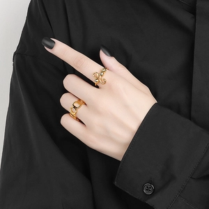 Golden anxiety fidget rings with rotating beads and chain design for stress relief