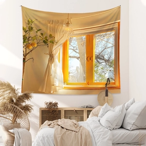 Detail of bohemian tapestry featuring window view with lemon tree and cozy lighting