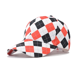 Red black and white diamond pattern baseball cap with geometric grid design and curved brim
