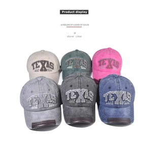 Selection of vintage washed cotton baseball caps with TEXAS embroidery in various colors