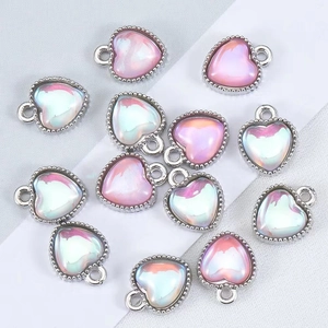 Pink laser heart pendants with silver metal edges for DIY jewelry making and necklaces