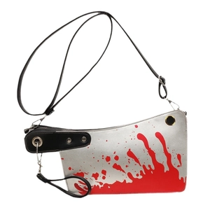 Kitchen knife shaped crossbody bag with red bloody handprint pattern on silver PU leather
