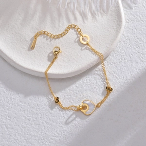 Elegant 14K gold titanium steel double-layer bracelet with heart and shell charms