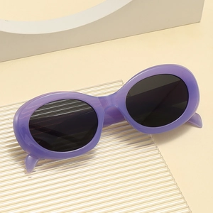Retro oval sunglasses with purple jelly frames and dark lenses for a stylish vintage look