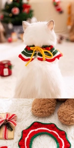 Close-up of a festive red and green knitted Christmas pet scarf with adjustable yellow tie