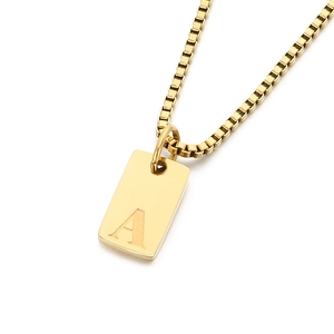 Golden box chain necklace featuring a rectangular metal pendant with letter A engraving