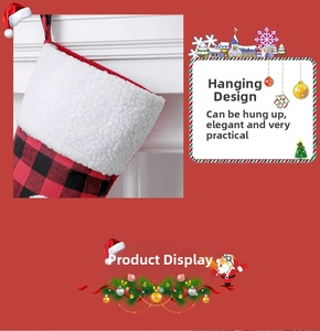 Close-up of red and black plaid Christmas stocking with white faux fur cuff and hanging loop