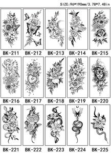 Catalog view of 15 black and white sketch tattoo stickers featuring roses and snakes