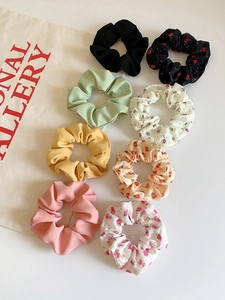 Detailed set of 8 floral and solid color chiffon scrunchies on white background
