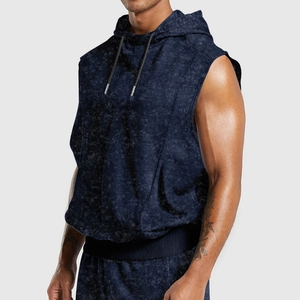 Side view of men's navy vintage distressed sleeveless hoodie showing fit and texture