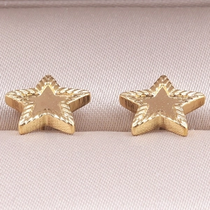 Macro shot of 304 stainless steel gold star earrings with textured double-layer design