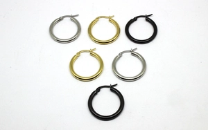 Close-up of 3mm round hoop earrings in gold, silver, and matte black stainless steel