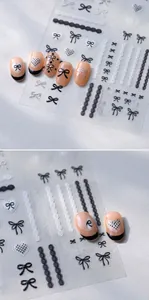 Detail of M-772 nail art stickers showing black and white bows on soft pink nails