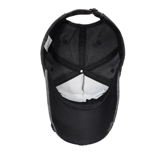 Inside view of washed cotton vintage baseball cap showing sweatband and adjustable strap