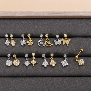 Surgical steel stud earrings with cubic zirconia charms in butterfly and clover designs