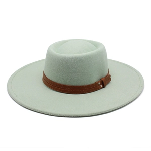 Close-up of wool felt hat with mint green texture and brown leather铆钉 strap detail
