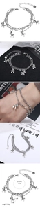 Detail of multilayer stainless steel bracelet with horse charms and measurement details