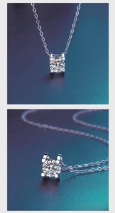 Détail macro du pendentif moissanite 1 carat avec monture classique en argent à 4 griffes