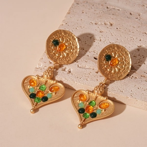 Vintage gold heart earrings with floral relief and colorful resin gemstones