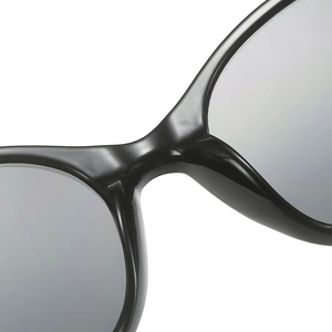 Pink 2023 autumn sunglasses with glossy black frame and grey lenses in macro front view