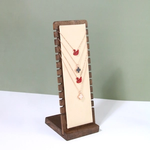 Vintage wooden jewelry display stand set featuring necklace and bracelet trays