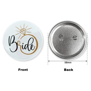 Front and back detail of 58mm white tinplate Bride badge with gold glitter ring icon