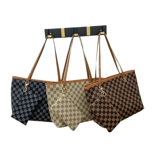 Three vintage checkered tote bags in black, white, and brown with matching small pouches