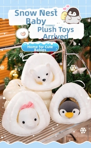 Detail showing plush polar bear and penguin charms with snow-nest storage bags