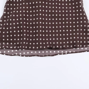 Polka dot halter neck top in coffee brown with dual-layered chiffon ruffle hem detail