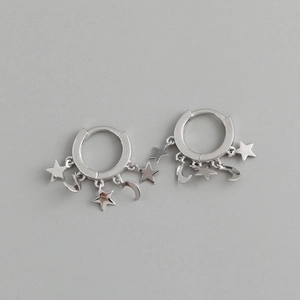 Silver rectangular hoop earrings featuring minimalist star and moon dangle charms