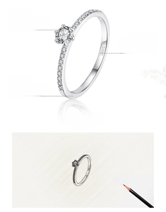 Detail of S925 silver ring featuring six-prong moissanite and side stones craftsmanship