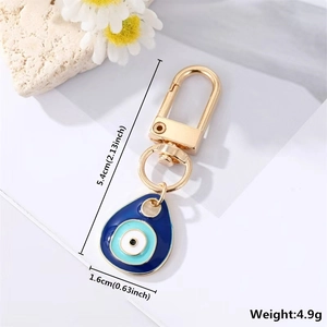 Detail view of Evil Eye charm keychain with dimensions 5.4cm height and 1.6cm width