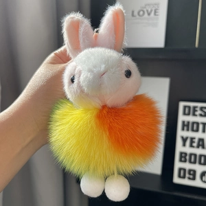 Cute plush rabbit keychain featuring a colorful gradient faux fox fur pom-pom and gold clip