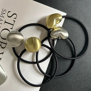 Minimalist elastic ponytail holders with brushed gold and silver heart and ball charms
