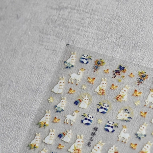 Exquisite Chinese style nail stickers featuring embroidered rabbit and panda designs