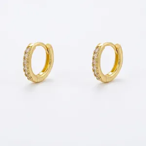 Classic 11mm gold huggie earrings in brass with micro-pave white zircon stones