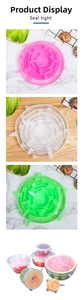 Detail view of colorful stretchable silicone lids sealing various sized bowls and fruits