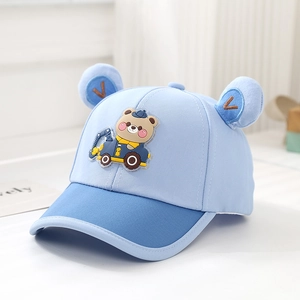 Cute light blue kids baseball cap with cartoon bear driving an excavator and 3D ears