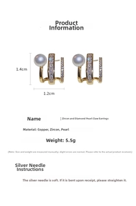 Macro detail of claw-shaped earrings with pearls and cubic zirconia on S925 silver pins