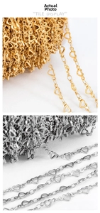Close-up of heart-shaped hollow link chains in polished gold and silver for DIY jewelry