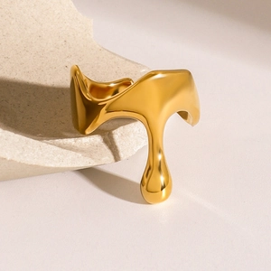 Minimalist golden stainless steel ring featuring unique fluid irregular dripping design